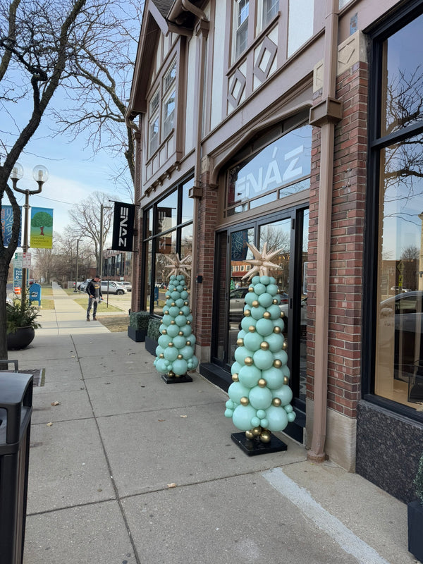 Pastel Green Christmas Tree Balloon Sculptures
