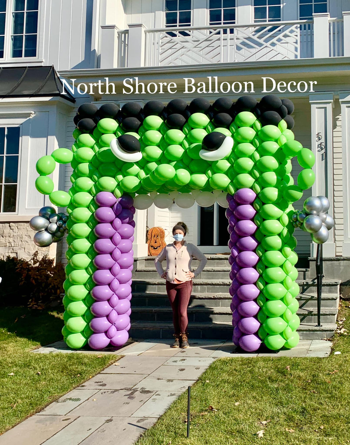 Enormous Frankenstein Sculpture Balloon Arch with Mouth Walkway