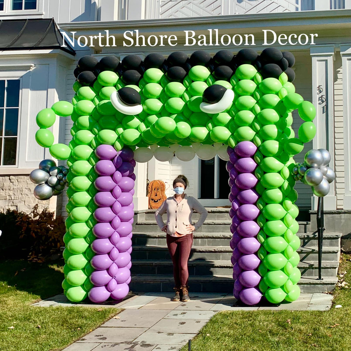 Enormous Frankenstein Sculpture Balloon Arch with Mouth Walkway