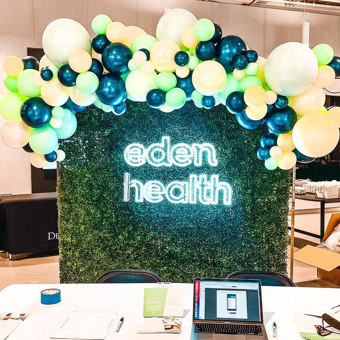 Green Brand Launch Garland with Business Name Hedge Wall & Helium Tassels