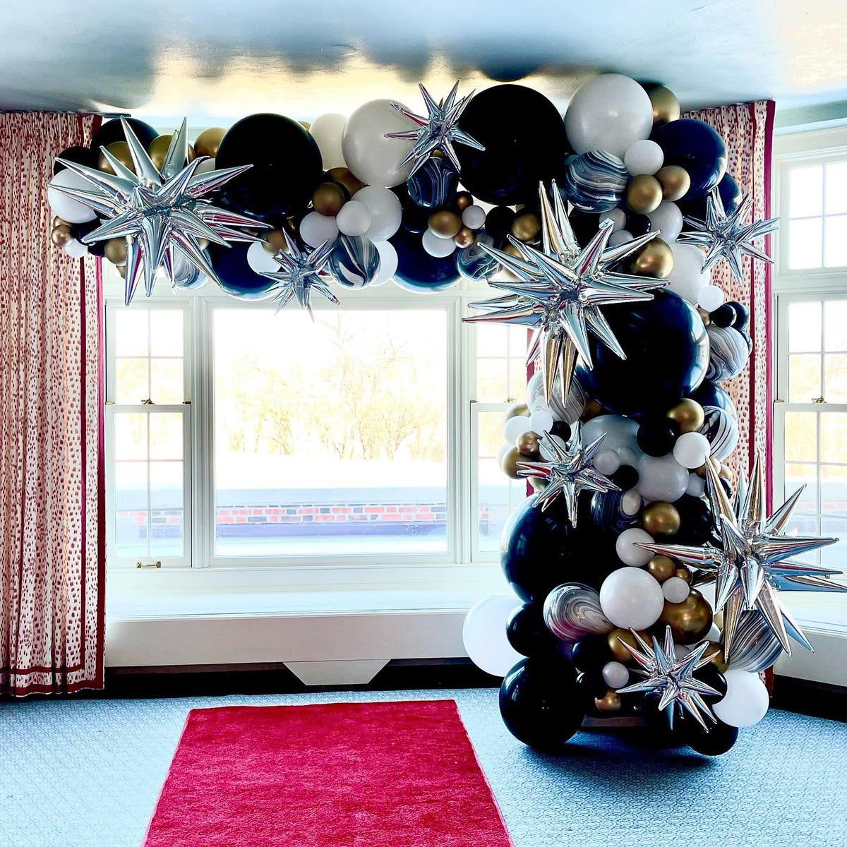 Showstopper Organic Demi Balloon Arch with 12 Point Spike Stars